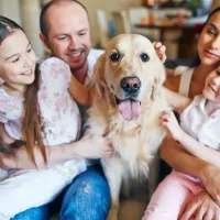 A family with their pet dog